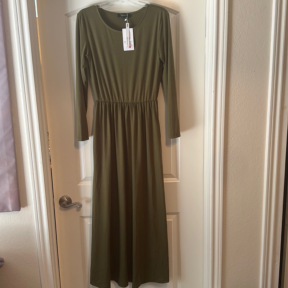 Long green maxi dress with long sleeves.